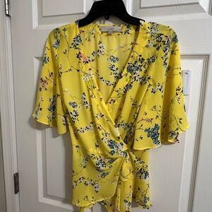 Charmin floral print yellow beautiful blouse.